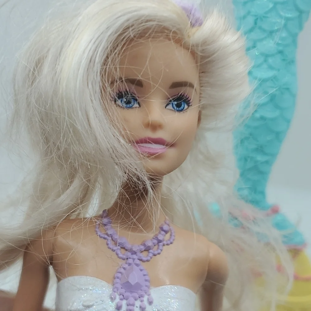 Mattel Dolls with Blonde Hair and Colorful Outfits